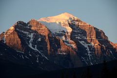 06 First Rays Of Sunrise On Mount Temple From Lake Louise Village.jpg